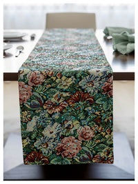 Floral patterned table runner on a dining table with a neutral background