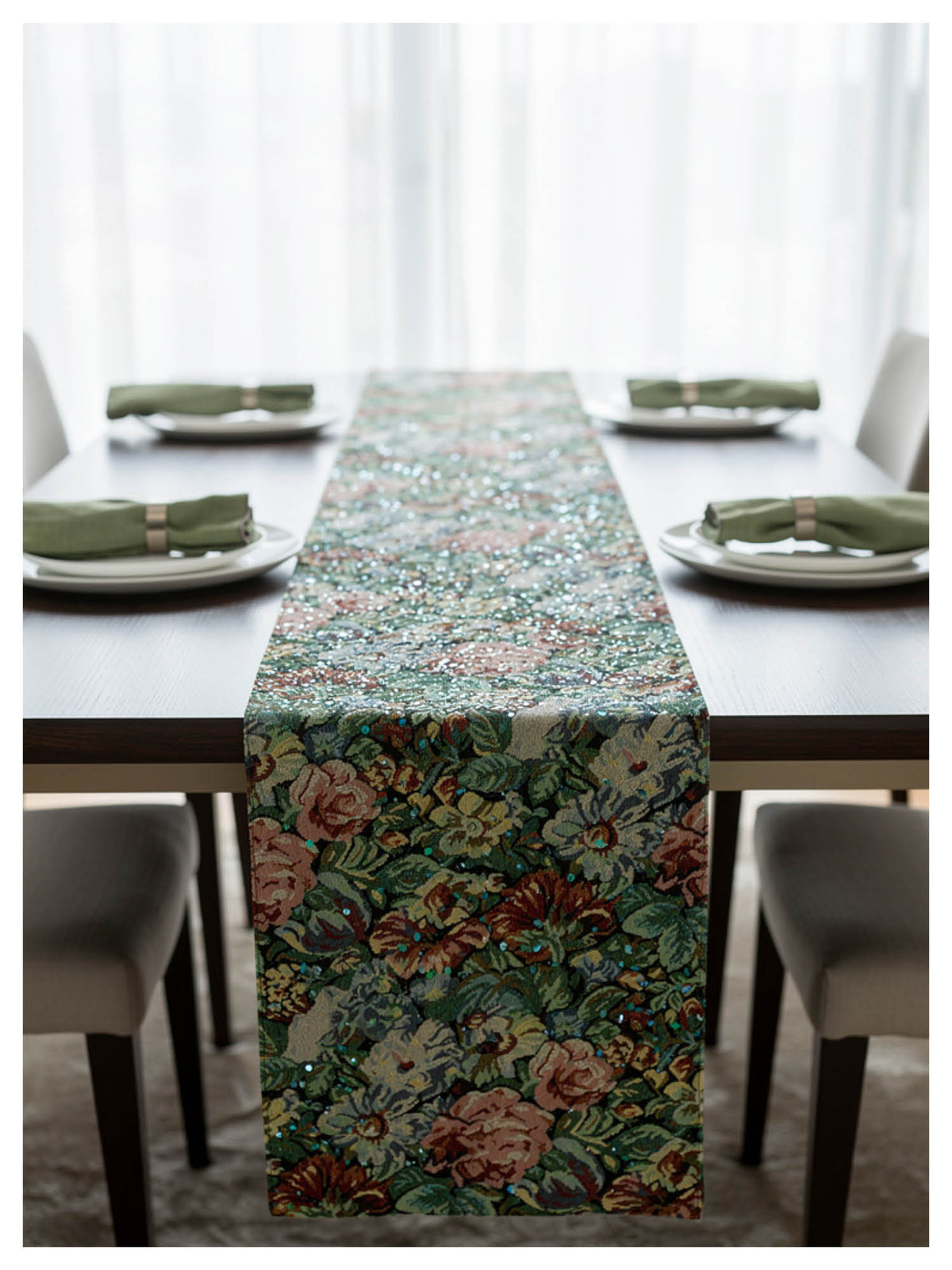 Green meadow floral jacquard table runner with metallic sequin detailing styled on a dining table