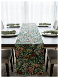 Green meadow floral jacquard table runner with metallic sequin detailing styled on a dining table