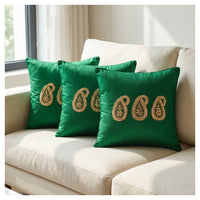 Green paisley gota motif cotton silk cushion covers with tie-up closure styled together on a sofa