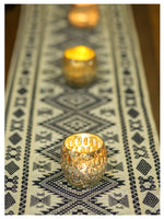 Tasseled table runner - White Aztec